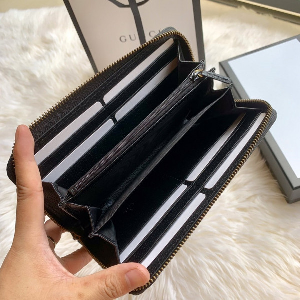 G*u*i leather zip around wallet