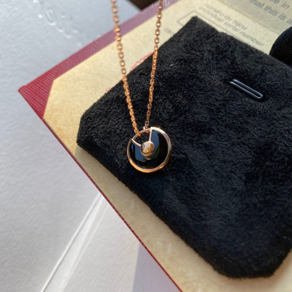 Ca*t*er amulet necklace